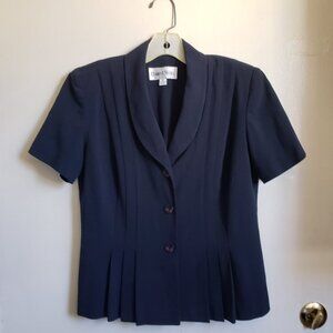 retro style navy short sleeve jacket top with flattering pleats
